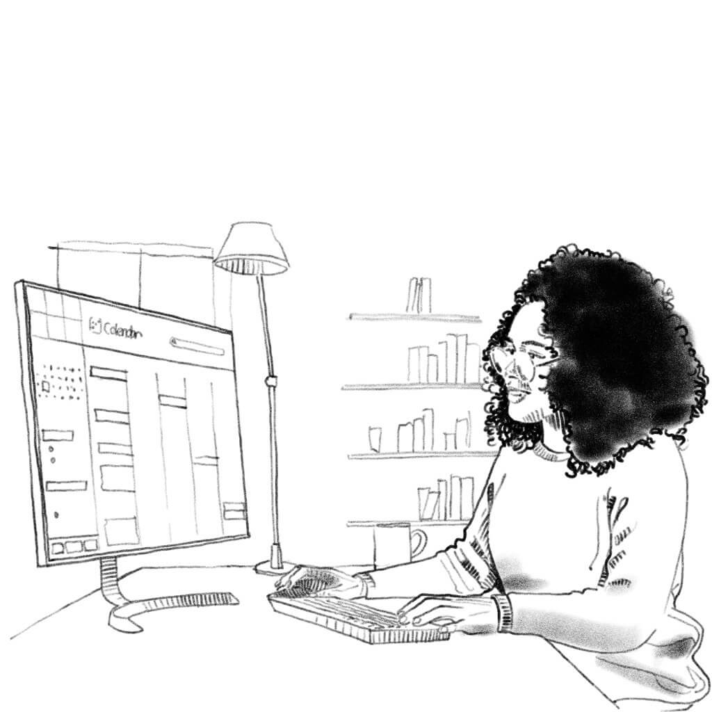 Woman Sitting at a Computer
